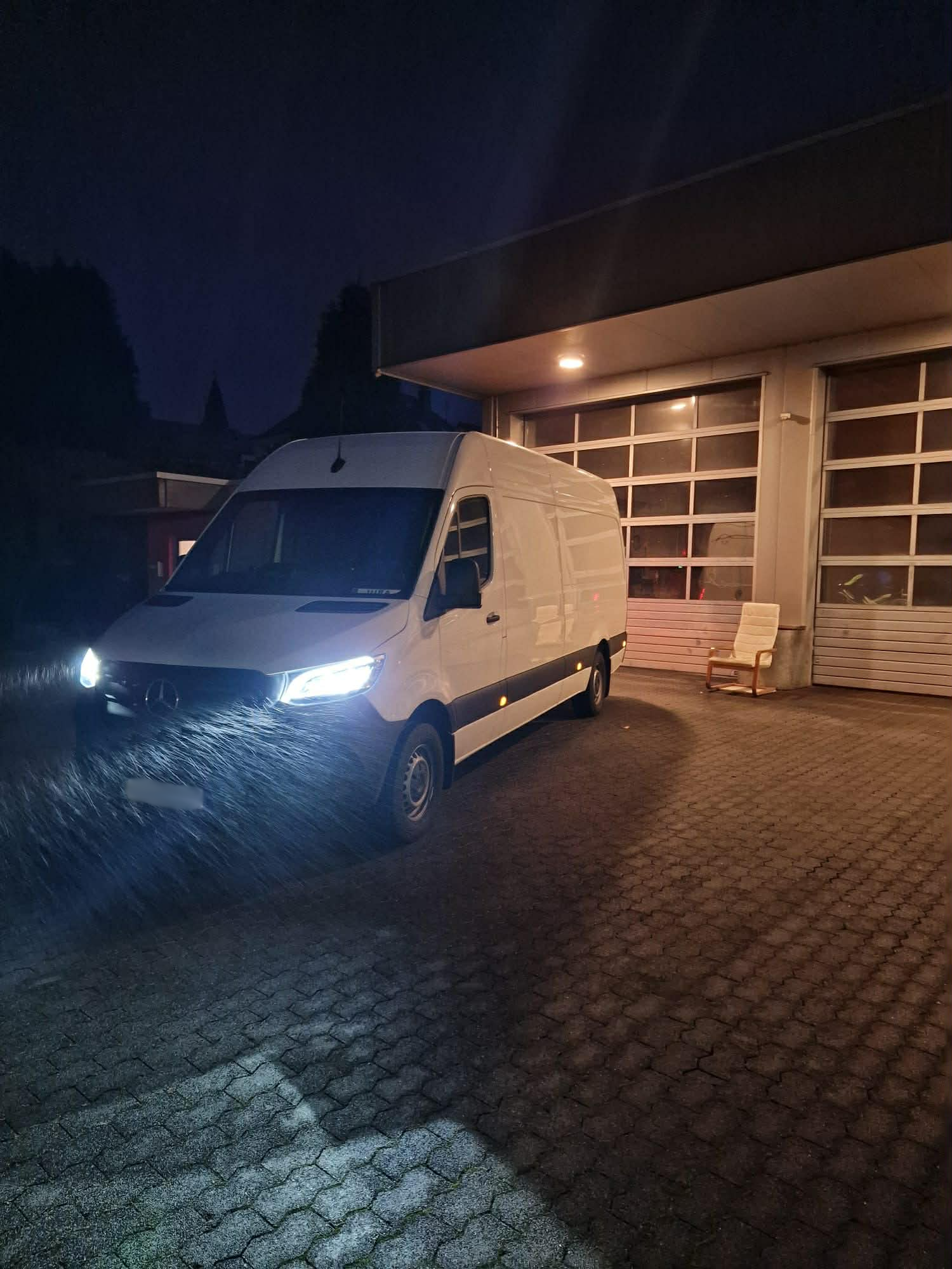 Mercedes Sprinter service van at night